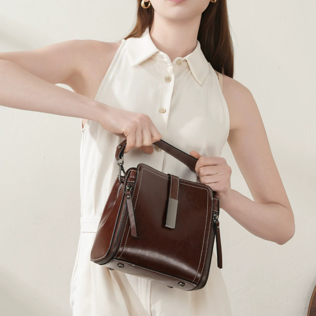 Velanci Ivory Belle Handbag: A Timeless Elegance