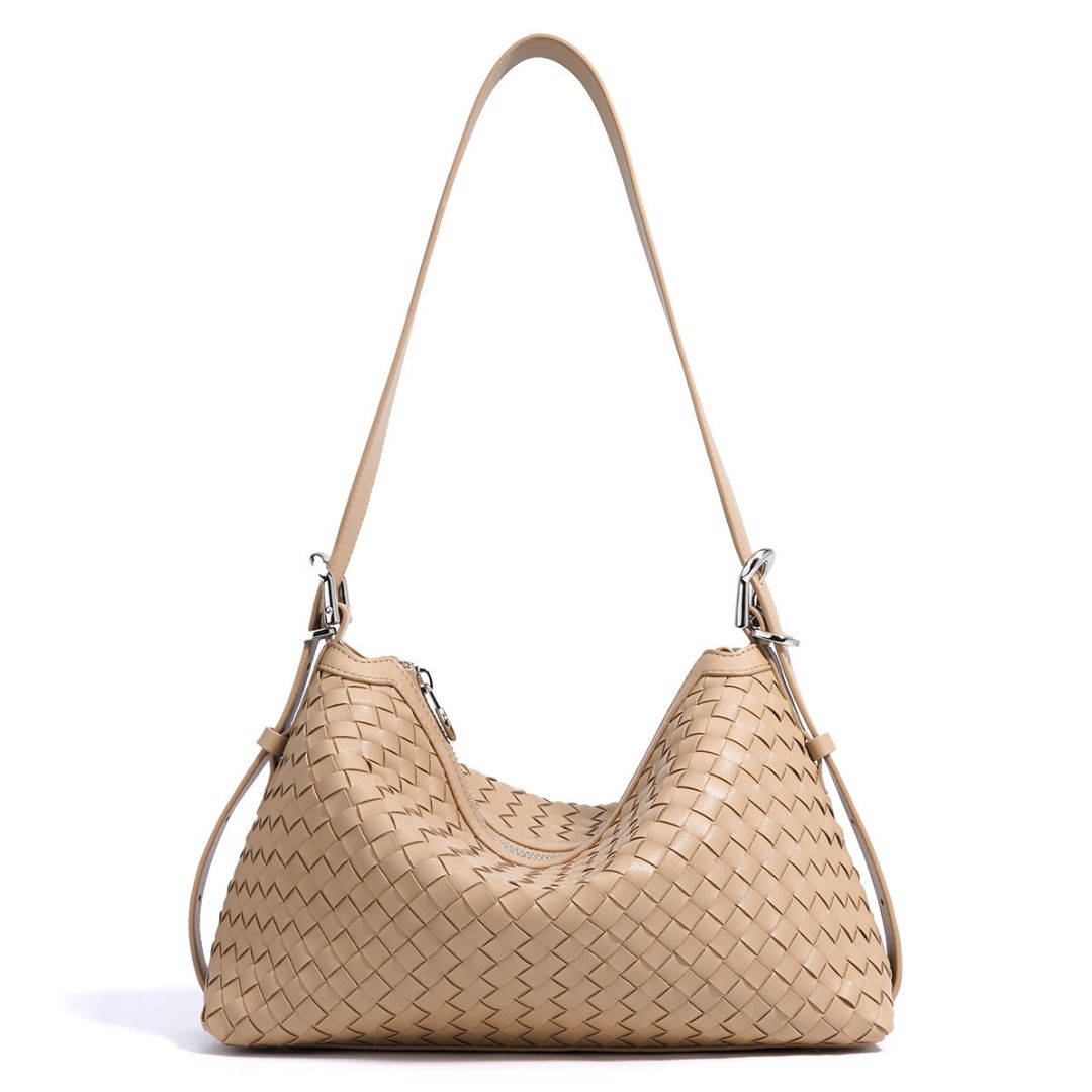 Velanci Luminous Crest Handbag: A Statement of Elegance