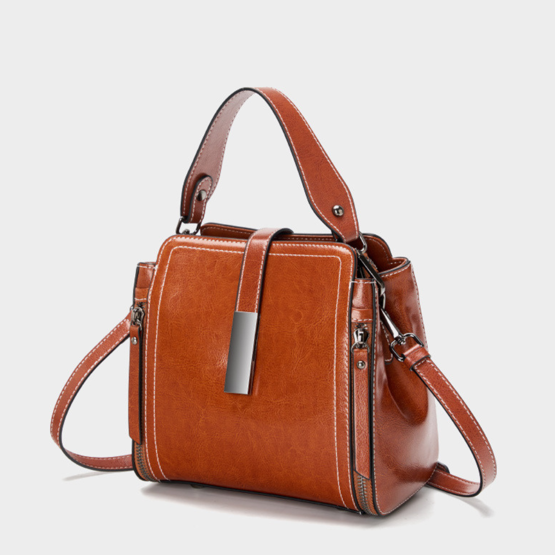 Velanci Ivory Belle Handbag: A Timeless Elegance