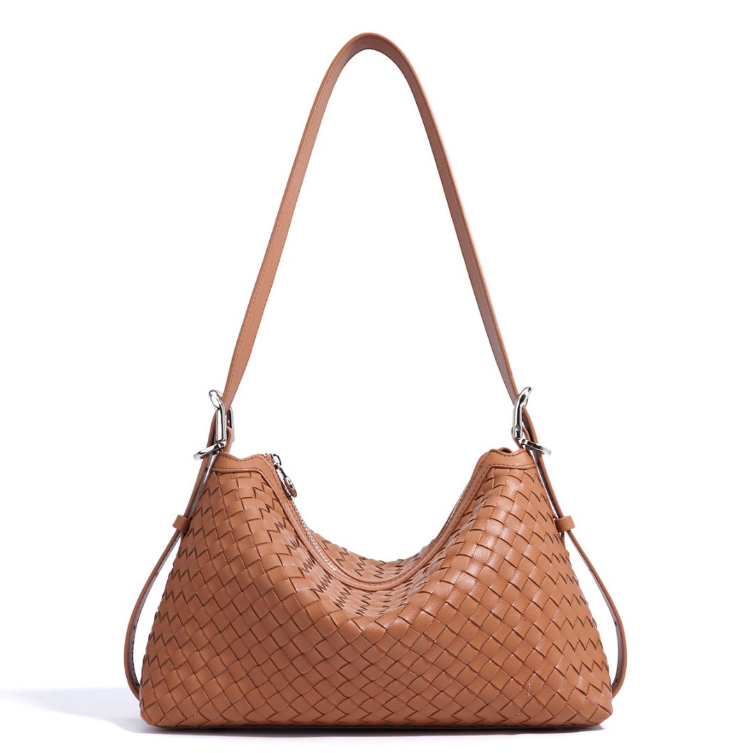 Velanci Luminous Crest Handbag: A Statement of Elegance