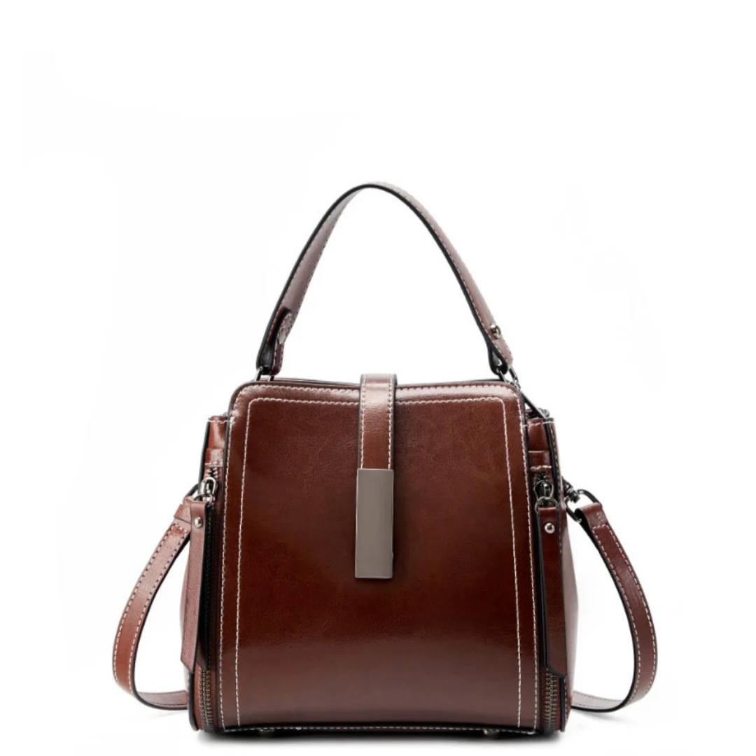 Velanci Ivory Belle Handbag: A Timeless Elegance