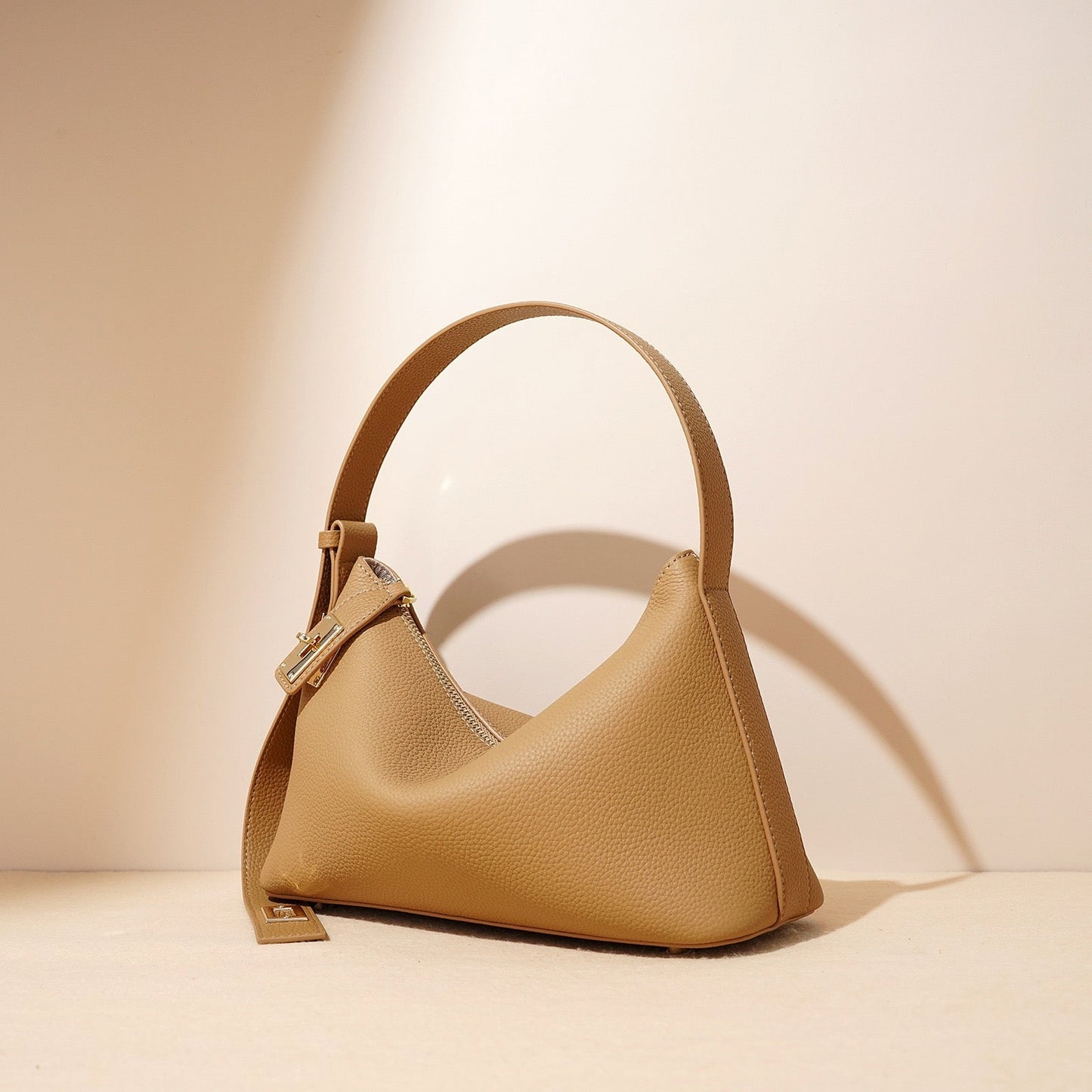 Togo Leather Signature Crossbody Dumpling Bag