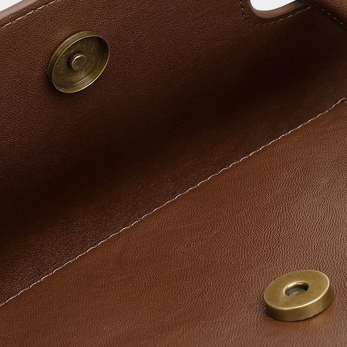 Vintage Luxe Leather Handbag with Buckle Accents