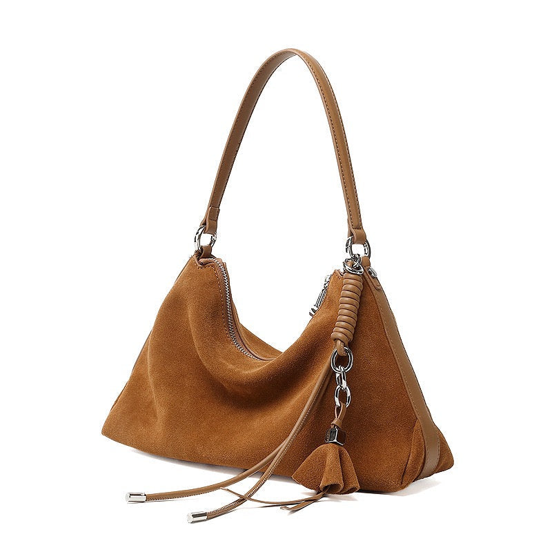 Suede Luxe Hobo Bag with Braided Elegance and Tassel Charm