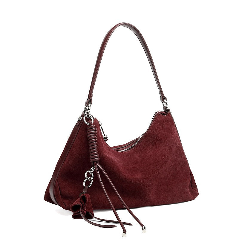 Suede Luxe Hobo Bag with Braided Elegance and Tassel Charm