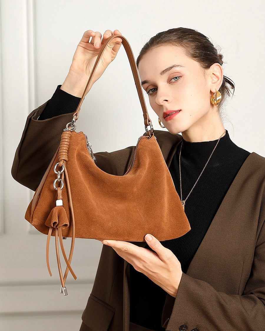 Suede Luxe Hobo Bag with Braided Elegance and Tassel Charm