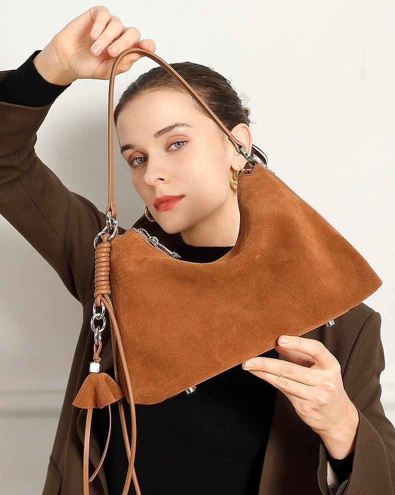 Suede Luxe Hobo Bag with Braided Elegance and Tassel Charm