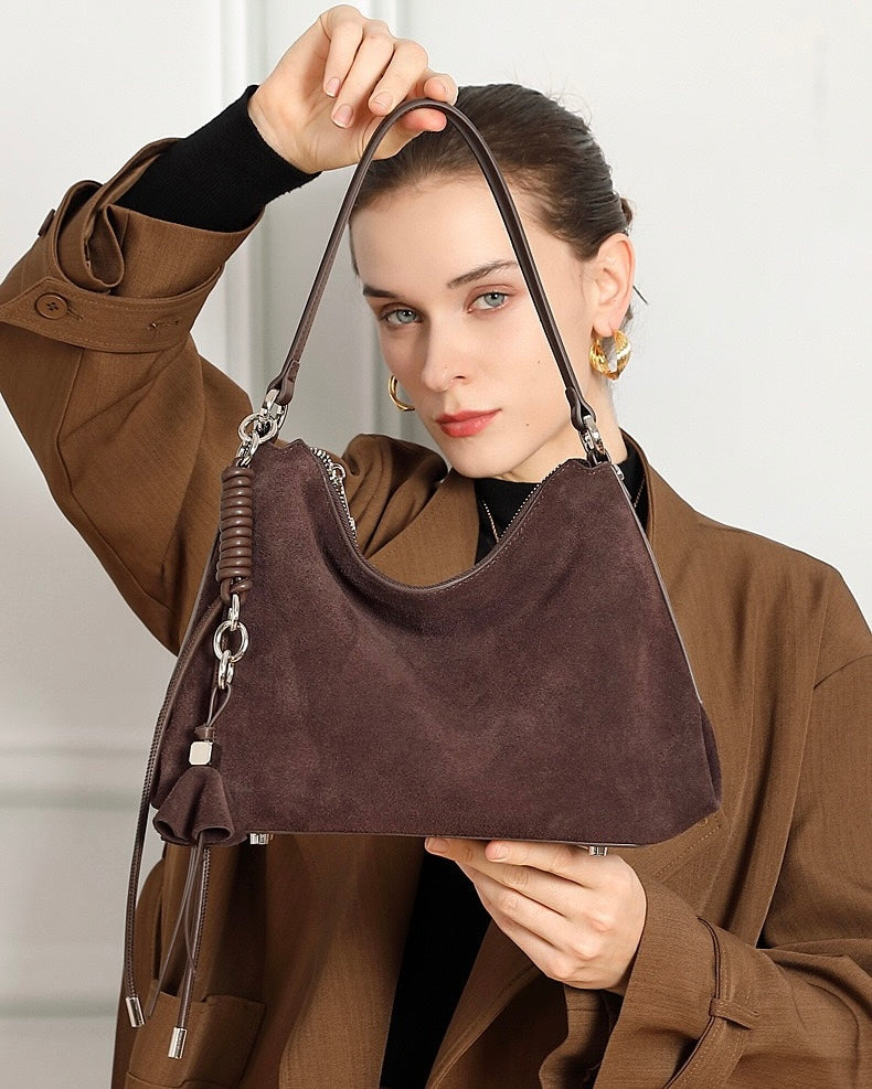 Suede Luxe Hobo Bag with Braided Elegance and Tassel Charm
