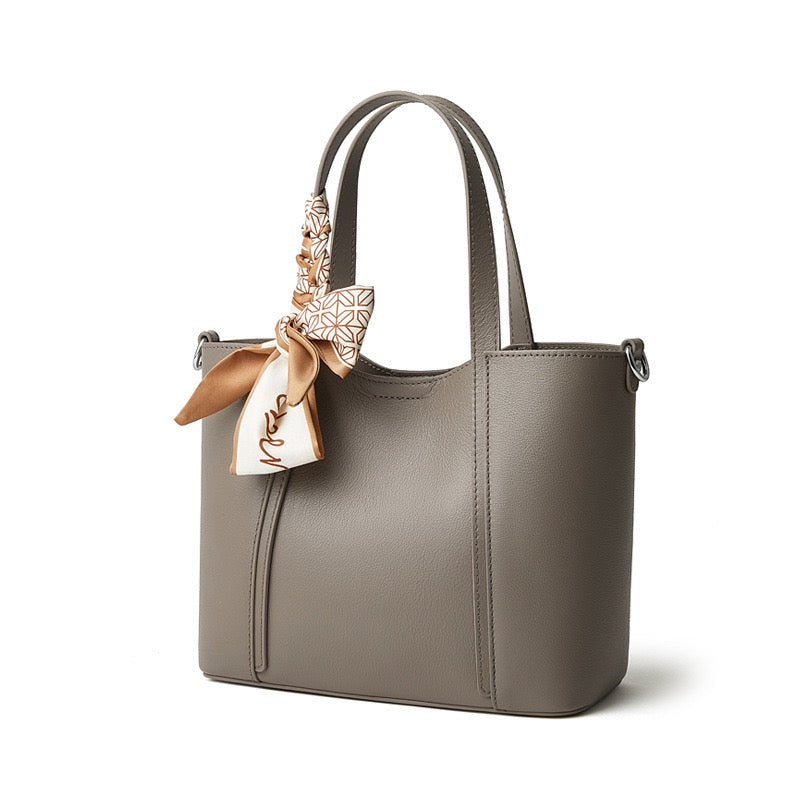 Elegant Leather Handbag with Signature Ribbon Detail