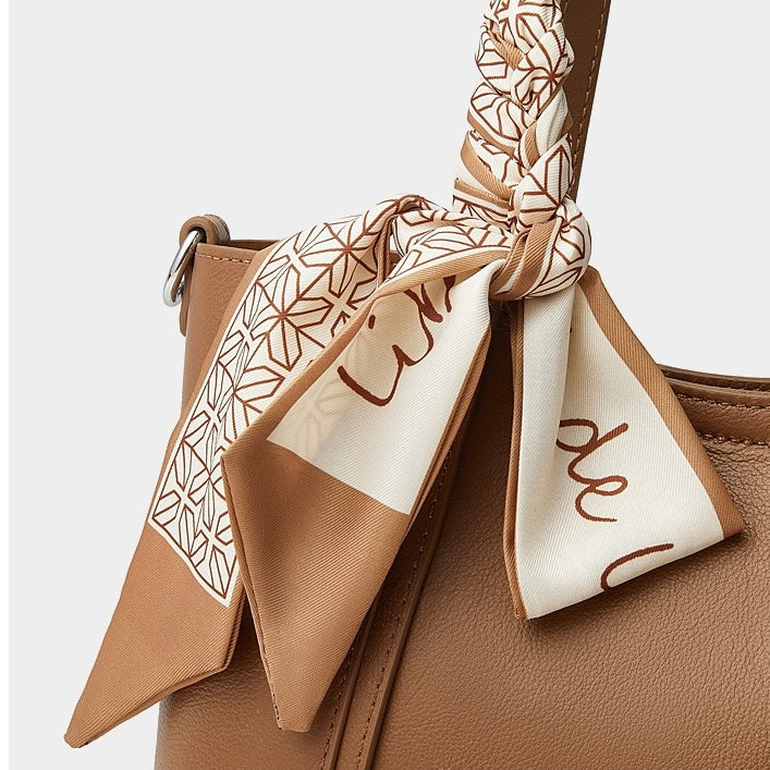 Elegant Leather Handbag with Signature Ribbon Detail