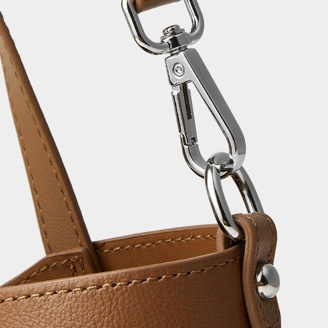 Elegant Leather Handbag with Signature Ribbon Detail