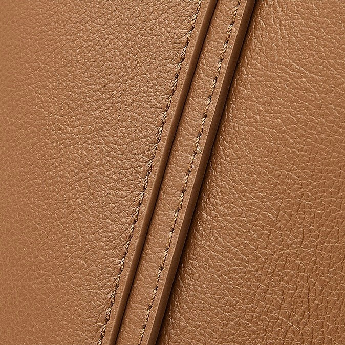 Elegant Leather Handbag with Signature Ribbon Detail