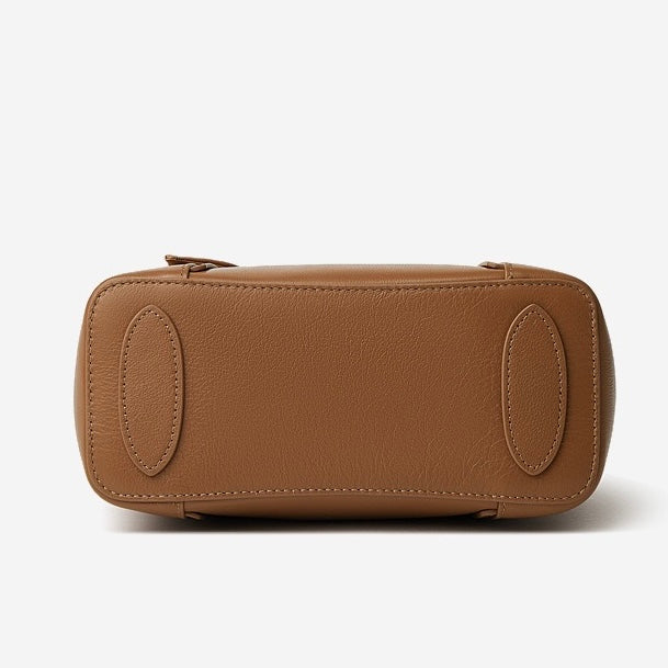 Elegant Leather Handbag with Signature Ribbon Detail