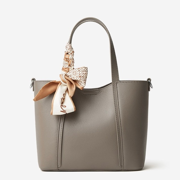 Elegant Leather Handbag with Signature Ribbon Detail