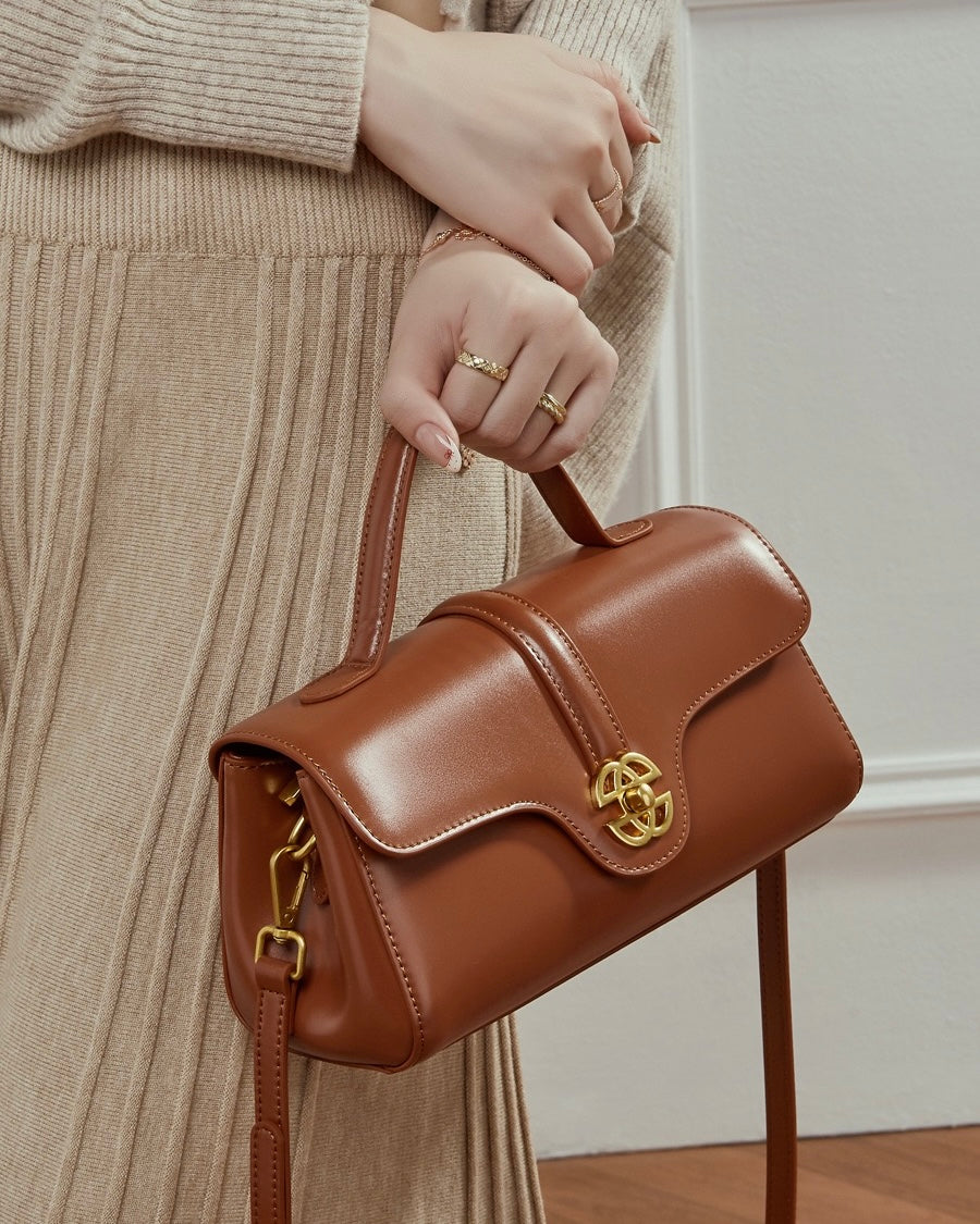 Elegant Genuine Leather Top-Handle Bag with Gilded Lock Closure