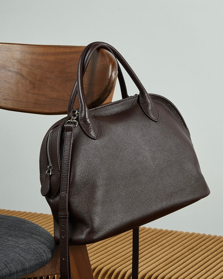 Grained Leather Dome Satchel: A Fusion of Elegance and Functionality