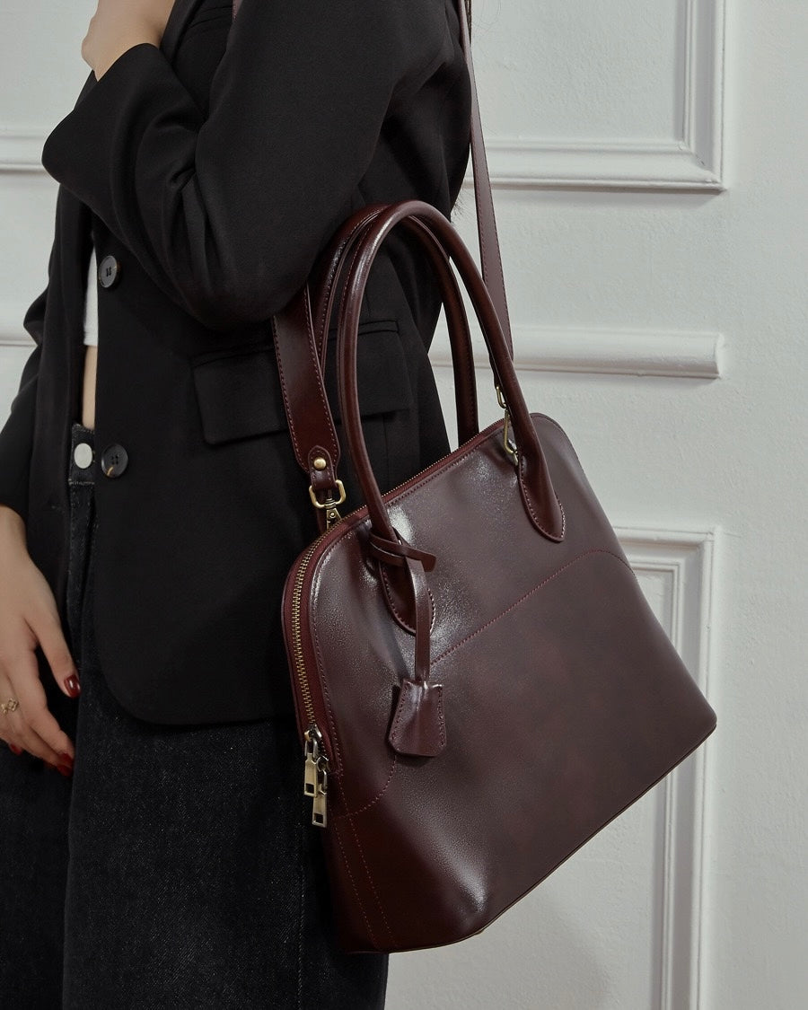 Genuine Leather Dome Satchel with Signature Tassel - Timeless Elegance