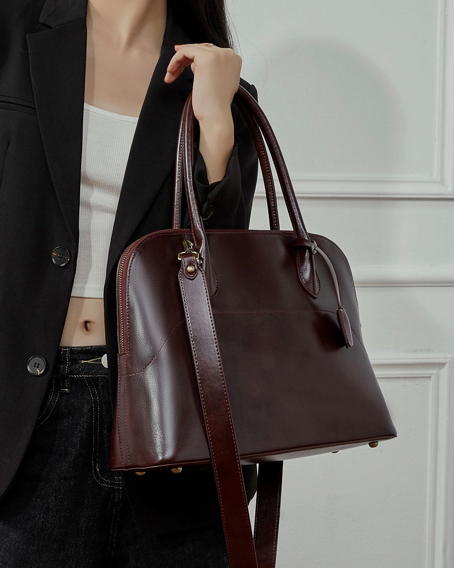 Genuine Leather Dome Satchel with Signature Tassel - Timeless Elegance