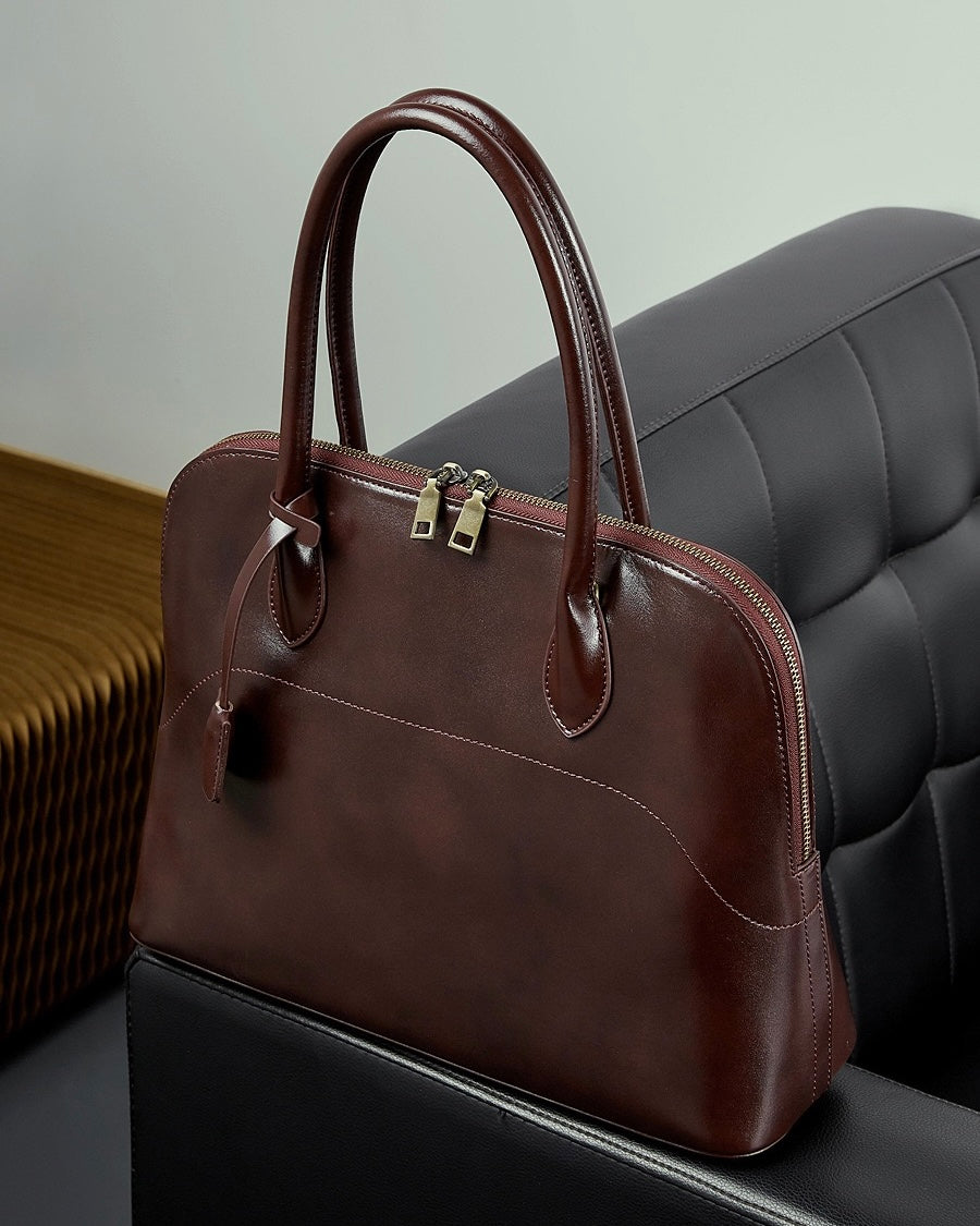 Genuine Leather Dome Satchel with Signature Tassel - Timeless Elegance