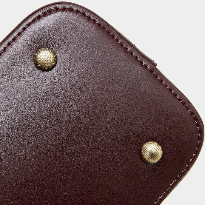 Genuine Leather Dome Satchel with Signature Tassel - Timeless Elegance