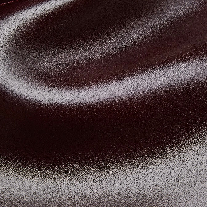 Genuine Leather Dome Satchel with Signature Tassel - Timeless Elegance