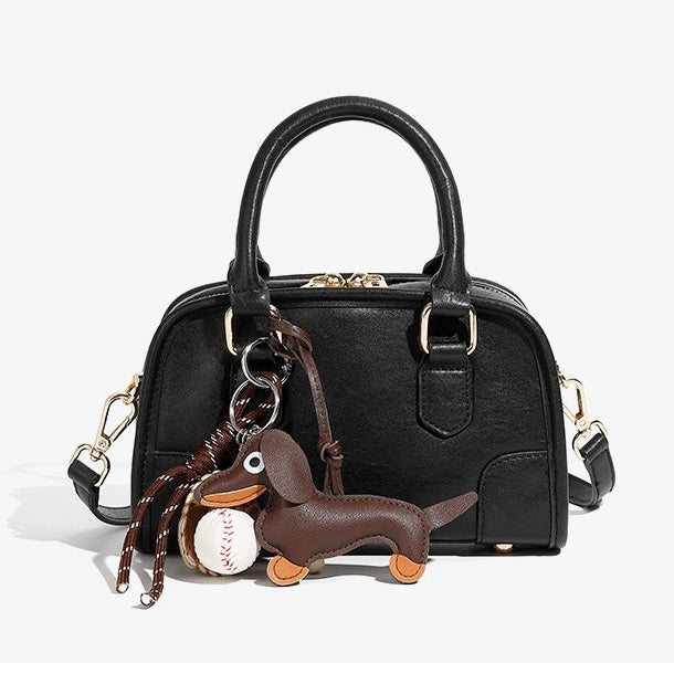 Chic Genuine Leather Boston Crossbody Bag with Whimsical Dachshund Pendant