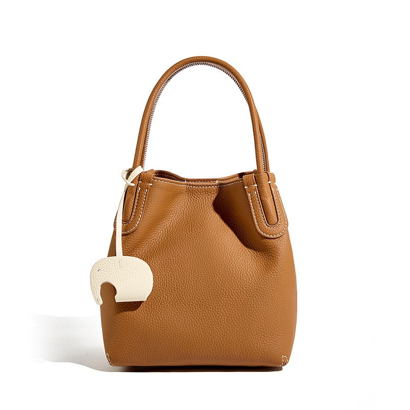 Elegant Leather Bucket Bag with Charming Elephant Pendant