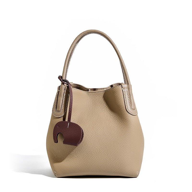 Elegant Leather Bucket Bag with Charming Elephant Pendant
