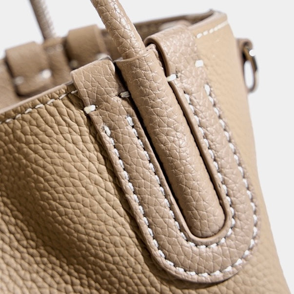 Elegant Leather Bucket Bag with Charming Elephant Pendant