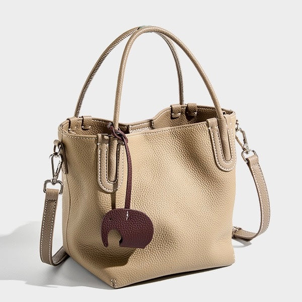 Elegant Leather Bucket Bag with Charming Elephant Pendant