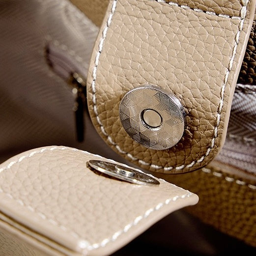 Elegant Leather Bucket Bag with Charming Elephant Pendant