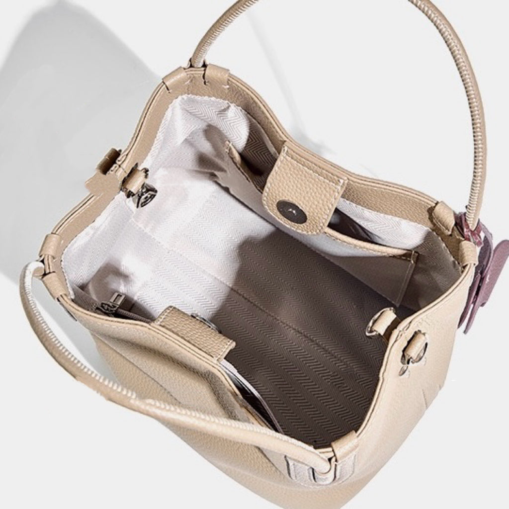 Elegant Leather Bucket Bag with Charming Elephant Pendant