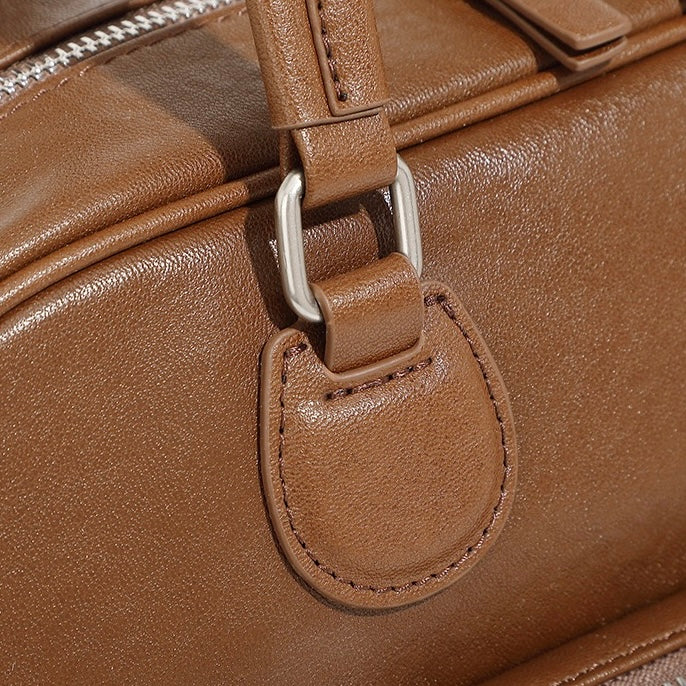 Vintage Genuine Leather Bowling Handbag with Sophisticated Side Pockets