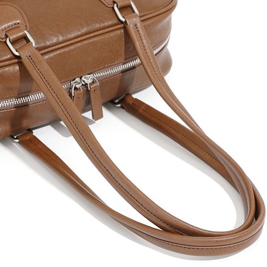 Vintage Genuine Leather Bowling Handbag with Sophisticated Side Pockets