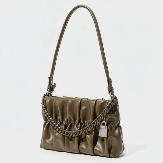 Brown handbag with a chain detail on a white background