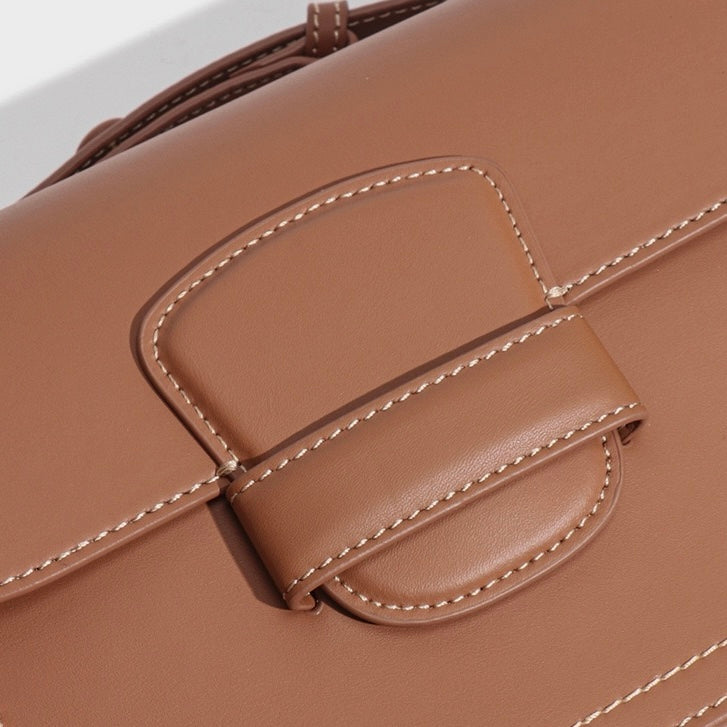 Elegant Leather Contour Stitch Saddle Bag