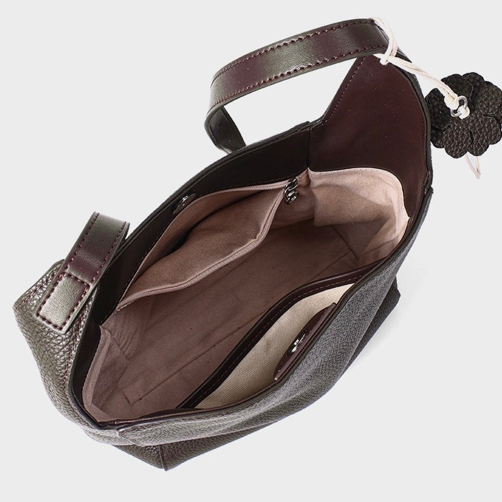 Elegant Full-Grain Leather Hobo Bag with Floral Charm