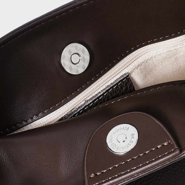 Elegant Full-Grain Leather Hobo Bag with Floral Charm