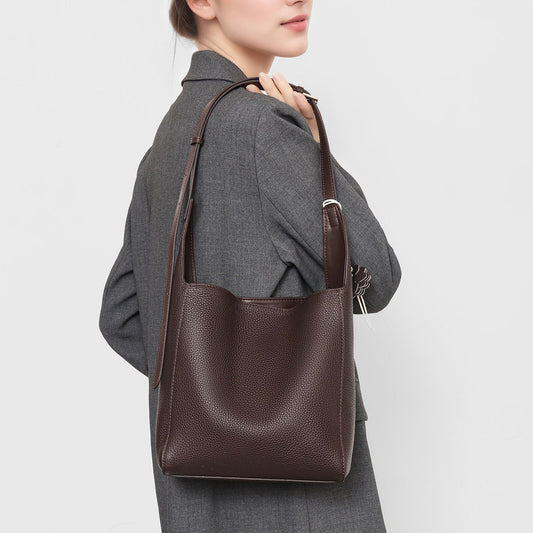 Elegant Full-Grain Leather Hobo Bag with Floral Charm