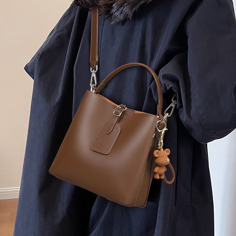 Coffee Genuine Leather Bucket Bag with Charming Bear Accent