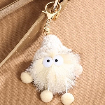 Chic Geometric Leather Crossbody Bag with Plush Charm