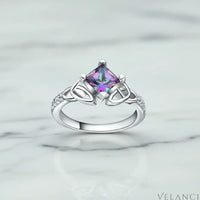 Silver ring with a colorful gemstone on a light gray background | Velanci Womens Ring