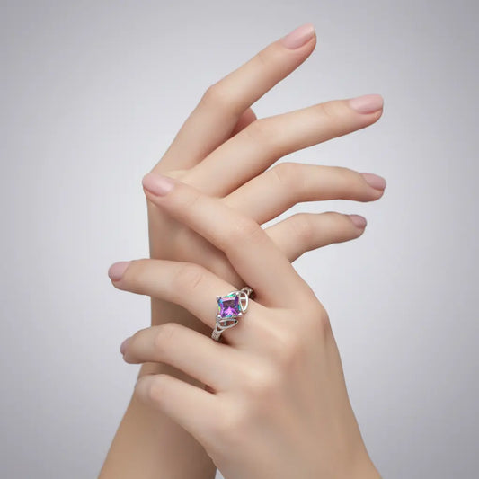 Silver ring with a colorful gemstone on a white background | Velanci Womens Ring