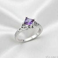 Silver ring with a colorful gemstone on a white background | Velanci Womens Ring