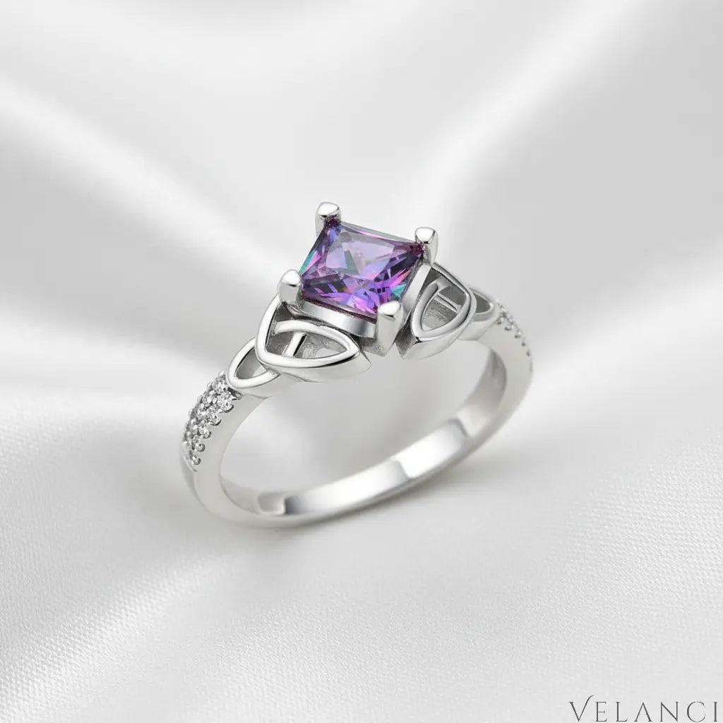 Silver ring with a colorful gemstone on a white background | Velanci Womens Ring