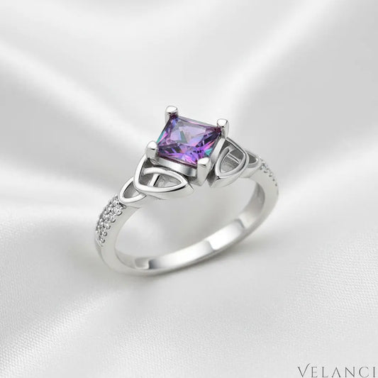 Silver ring with a colorful gemstone on a white background | Velanci Womens Ring