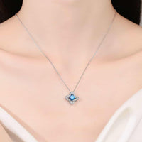 Blue Moissanite Floral Pendant Necklace - 1 Carat Halo Velanci